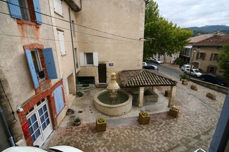 Fountain on left dated from 1700's and comes from a spring. It oveflows into old Roman washbasin (lavoir) on the right where some locals still wash their clothes. When they wash on the angled stone surface on the edge, the water runs off into a  drain around the inside, and off to somewhere else, keeping the water cleaner. For some reason, Anne preferred the washing machine inside...