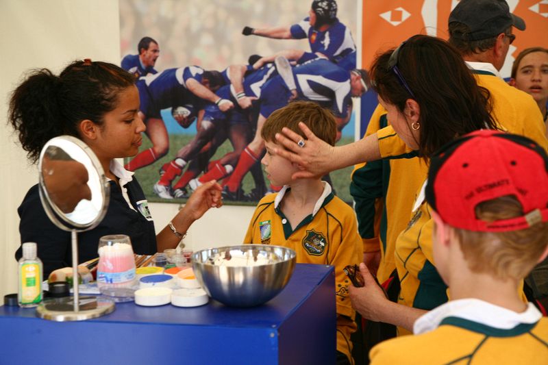 Anne and Ben wanted to get their faces painted, and dragged Sam along for the ride.